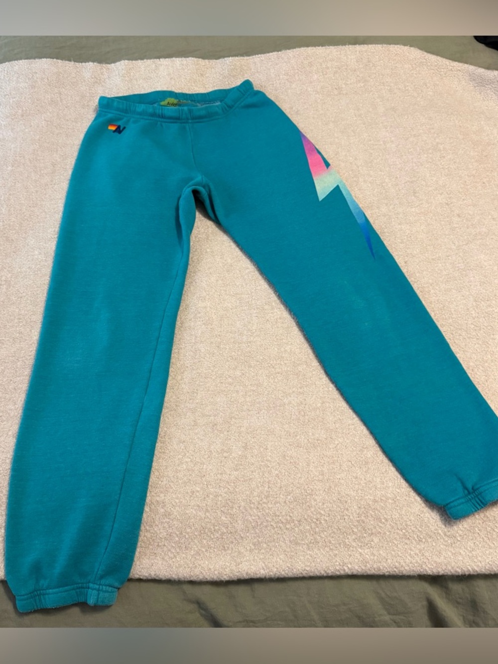 Aviator Nation Teal Sweatpants with Rainbow Lightning